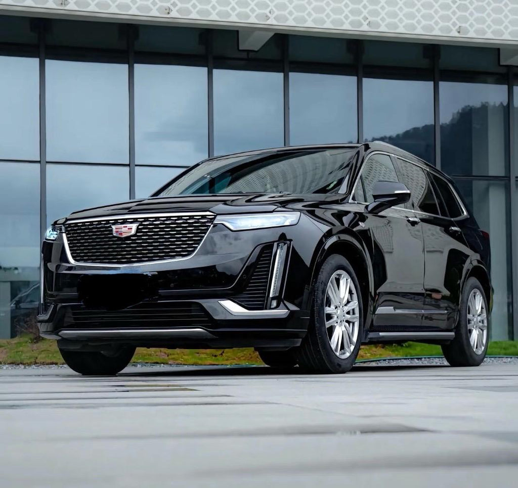 🔹 Black Cadillac LyriQ or XT-6 — When Cadillac Isn’t, Luxury Is
