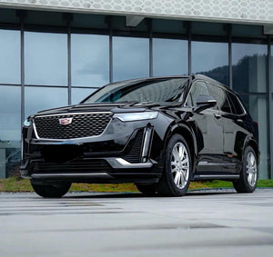 🔹 Black Cadillac LyriQ or XT-6 — When Cadillac Isn’t, Luxury Is